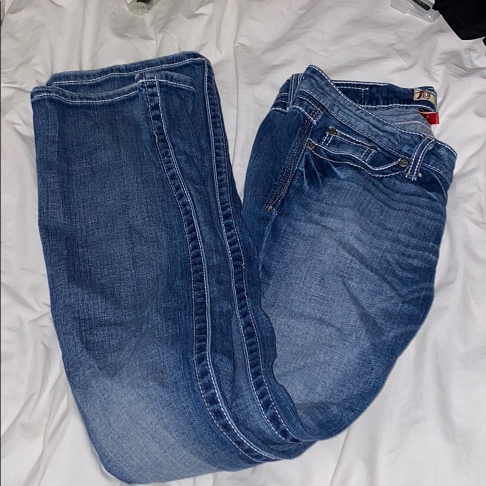 buckle low rise flare jeans